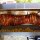 Whole Hog Roast on the spit with baby roasted potatoes, rosemary and garlic. Spit and Grill BBQ Company