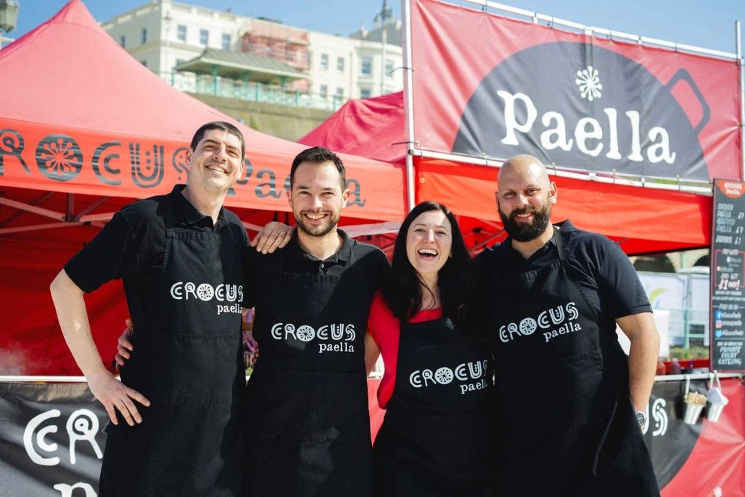 The Crocus Paella team in front of their food hut
