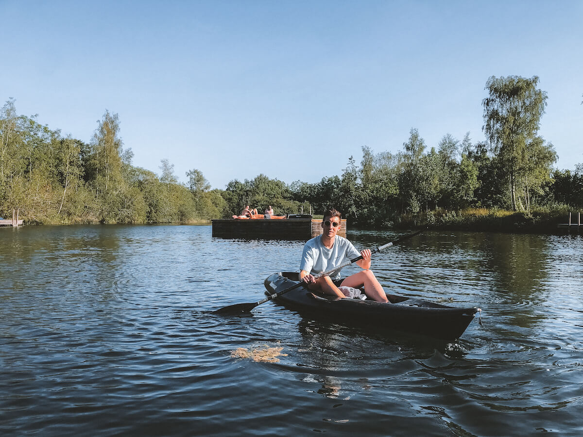 Co-founder Ben on a kayak on a lake in the Cotswolds