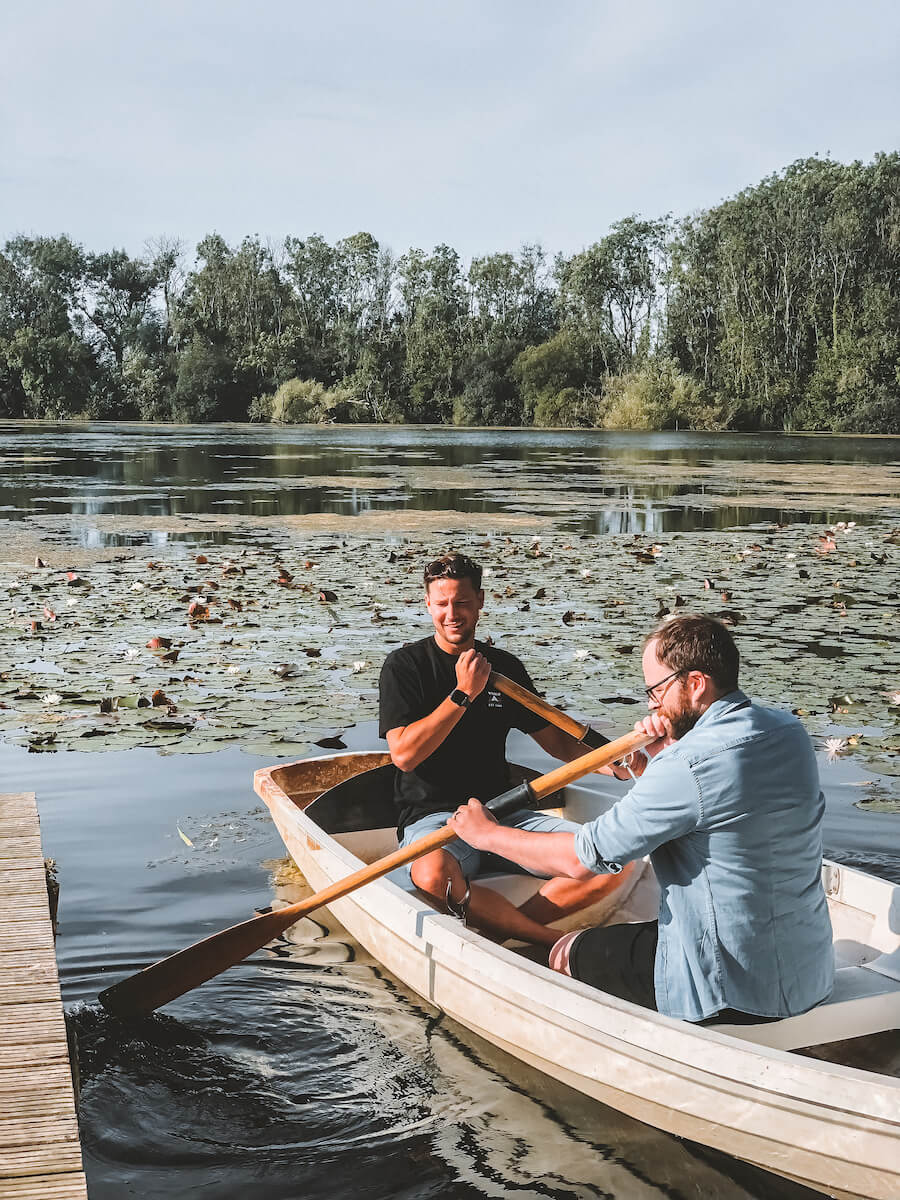 Joe and Darren heading out onto the lake in a canoe at the september retreat