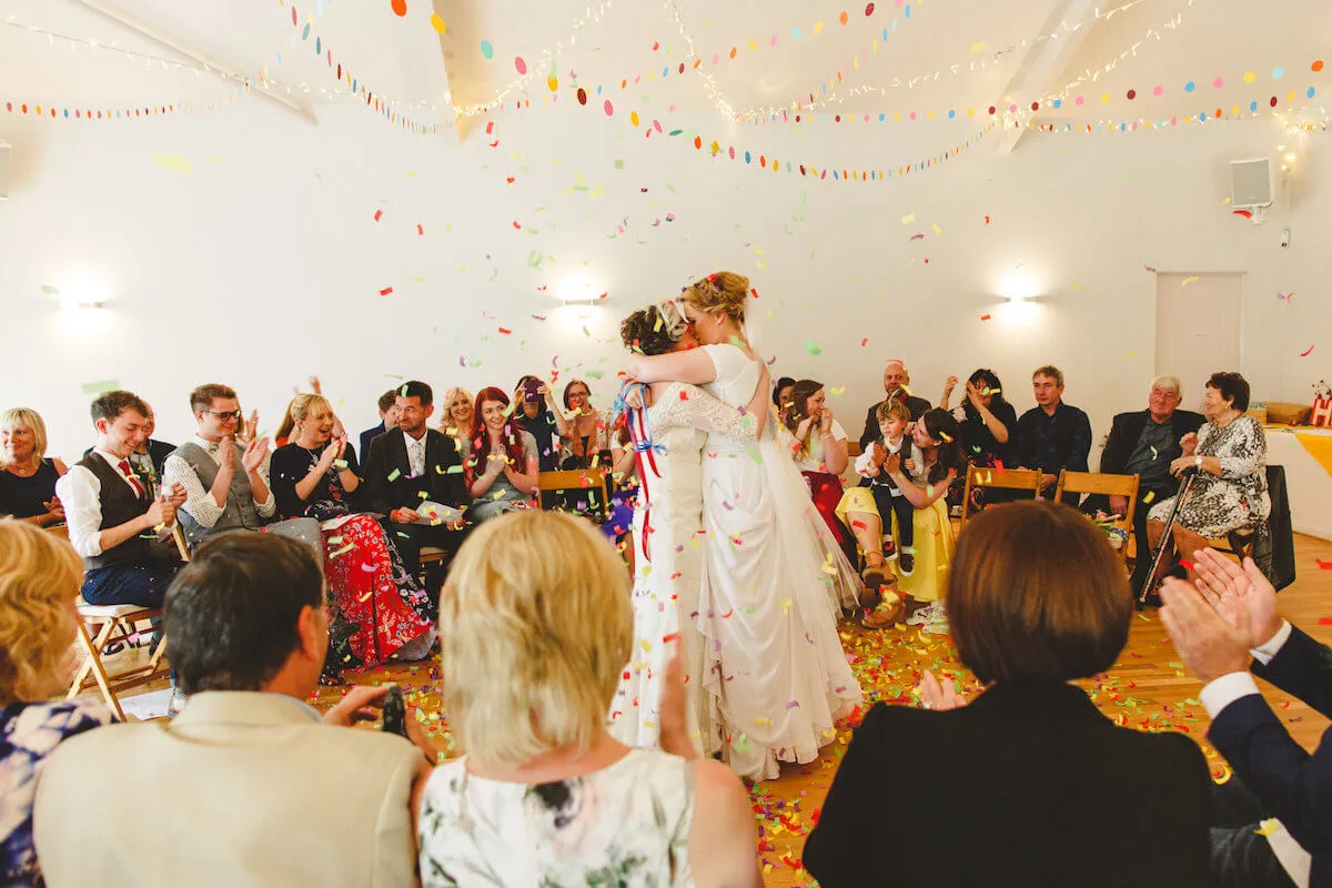 First dance for lesbian newly weds in tipi marquee. Image courtesy of Camera Hannah Photography