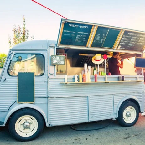 Image of a retro converted Citroen food van at an outdoor event