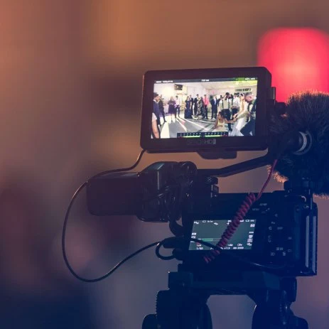 Up close image of a video camera screen recording at a wedding