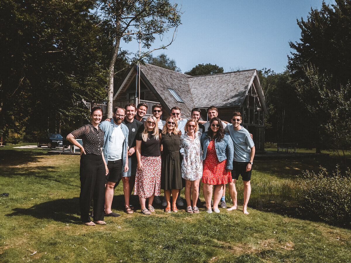 The Add to Event team in front of the beautiful Lakehouse