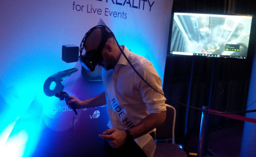 Male trying virtual reality experience at a conference event