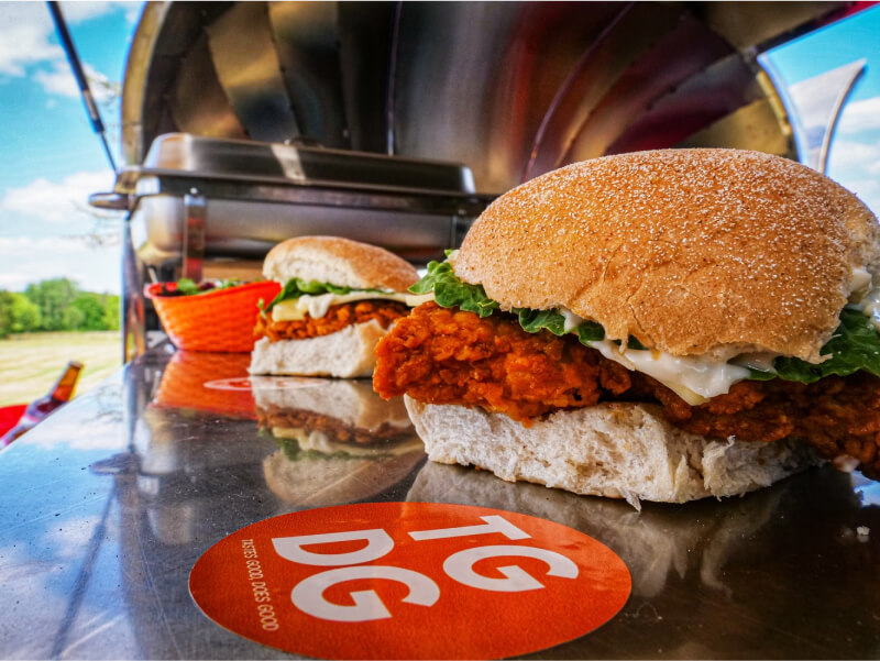 Up close of fried chicken burgers from Tastes Good, Does Good