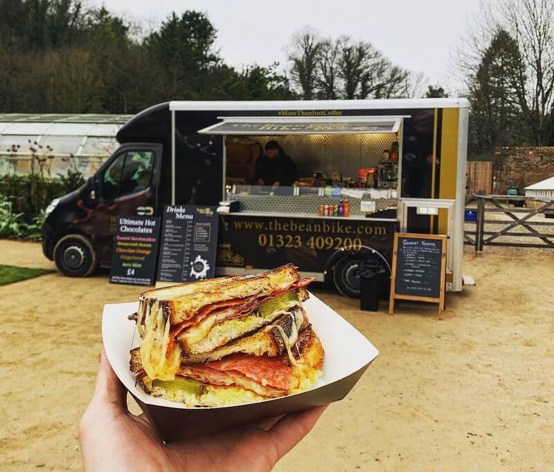 Grilled cheese toastie in front of the Bean Bike food van