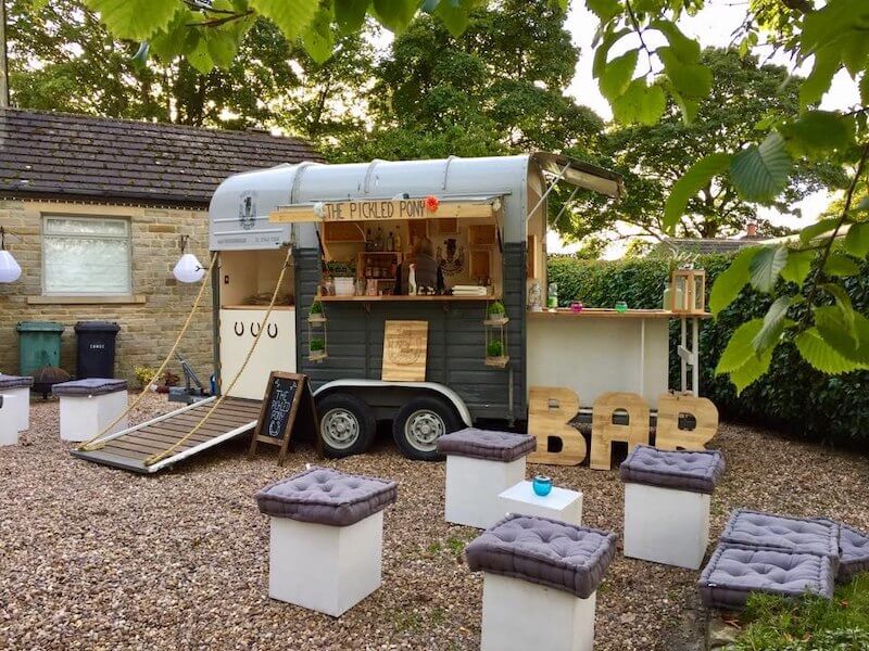 The Pickled Pony horsebox bar with outdoor stools and seating