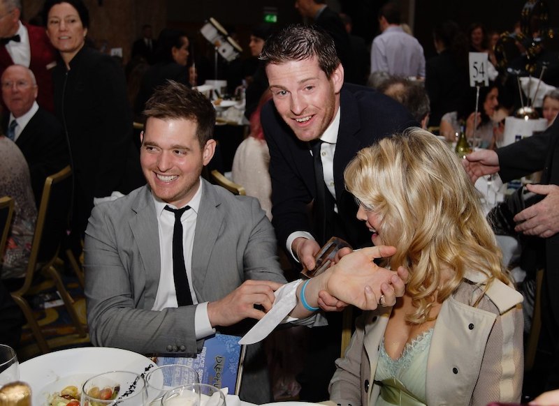 Magician Paul Lytton entertaining Michael Bublé at event