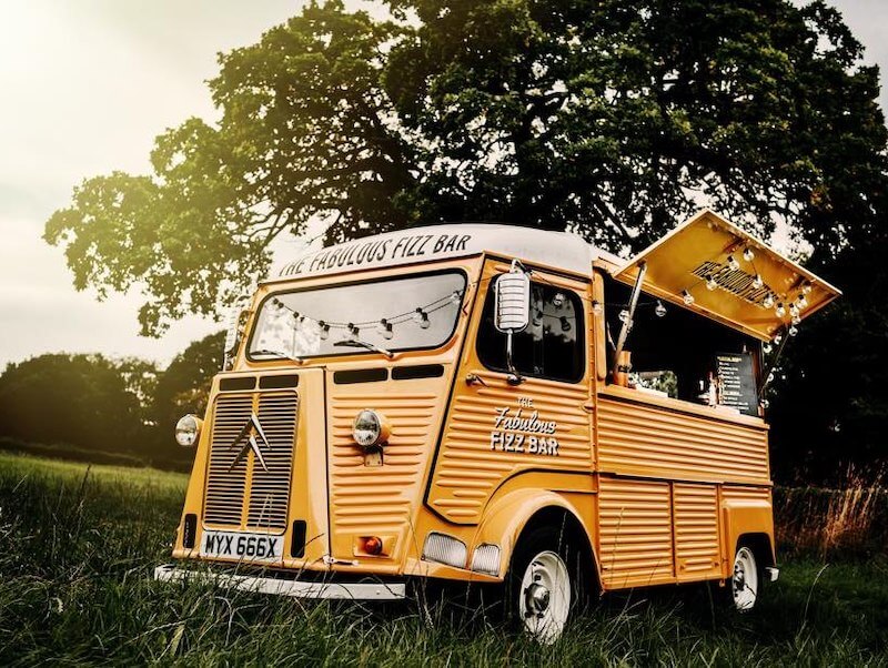 The Fabulous Fizz Bar's converted Citroen mobile bar in a field