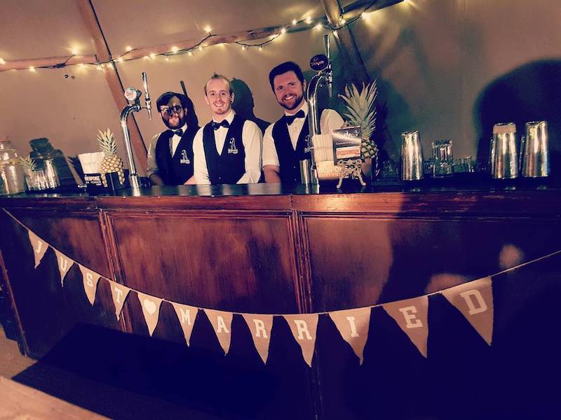 Three bartenders ready to serve from The Bespoke Bartender Company