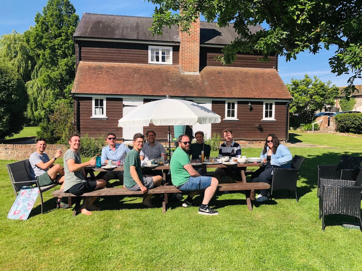 Add to Event team sitting outside for breakfast in the garden