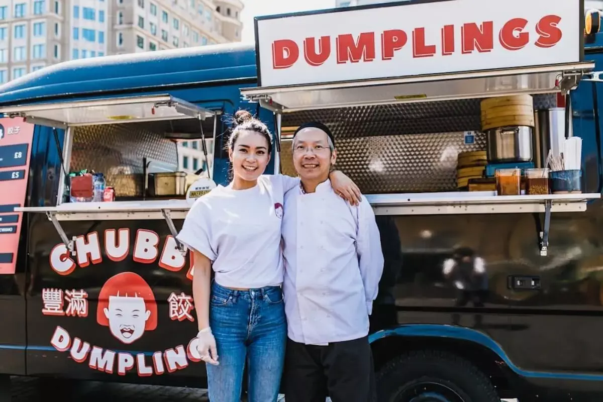 chubby dumpling food van owners outside food van