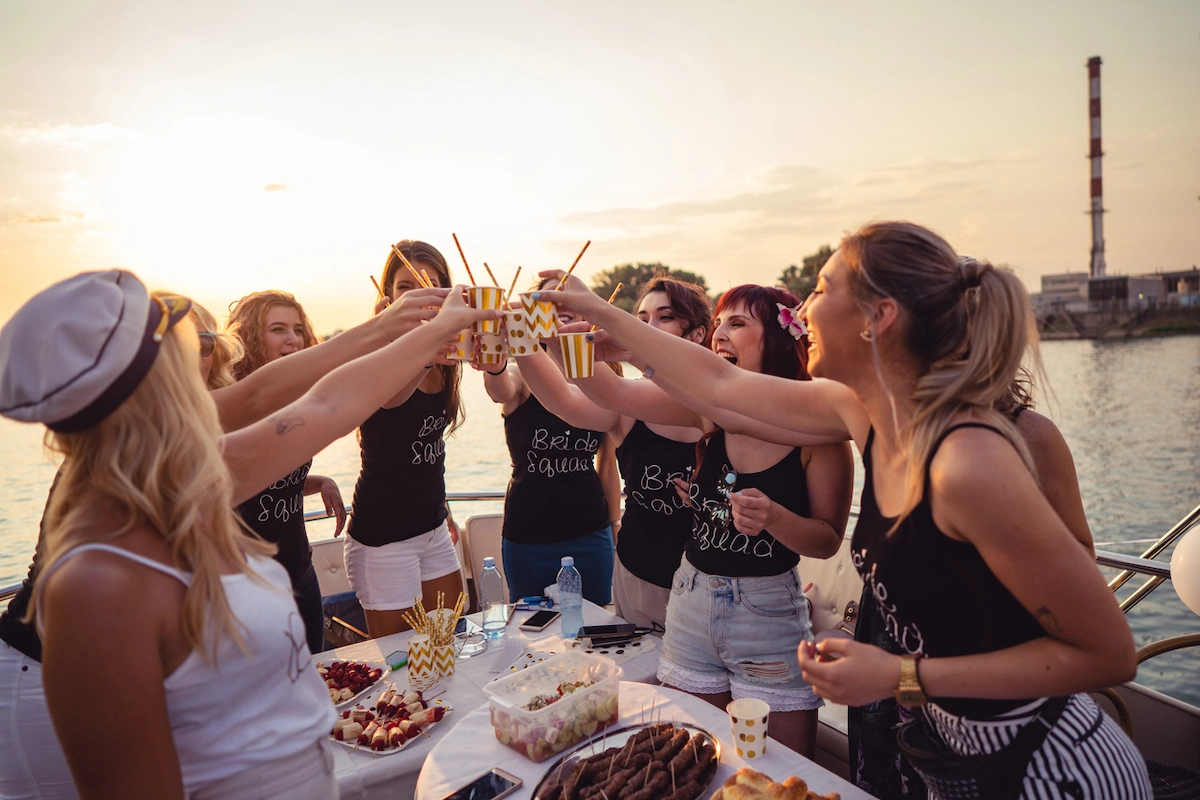 Ladies toasting to celebrations at a hen party