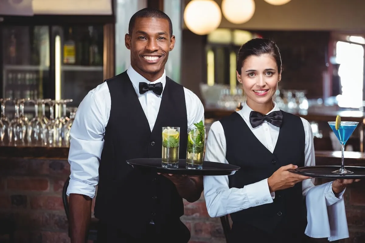 Delegate the work and hire some waiting staff for your event.